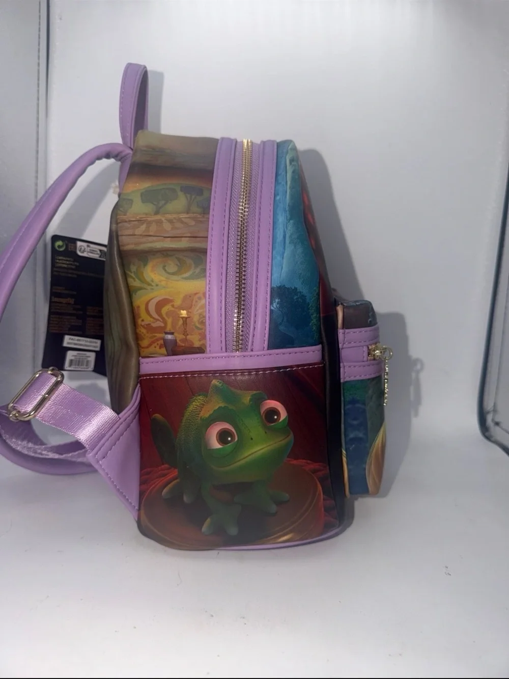 Loungefly Tangled Rapunzel Movie Scenes mini backpack w/ charm